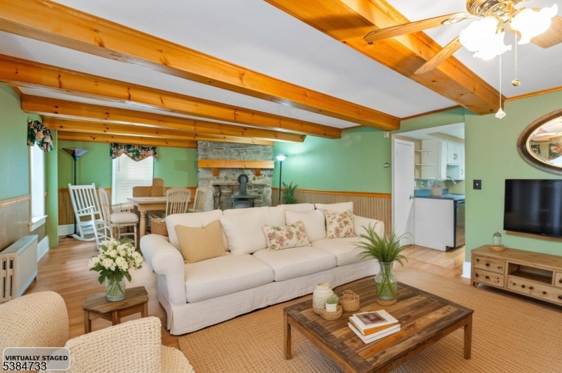400 Quaker Church Road Randolph, NJ 07869 - Photo 13 of 34 a living room with furniture and a flat screen tv