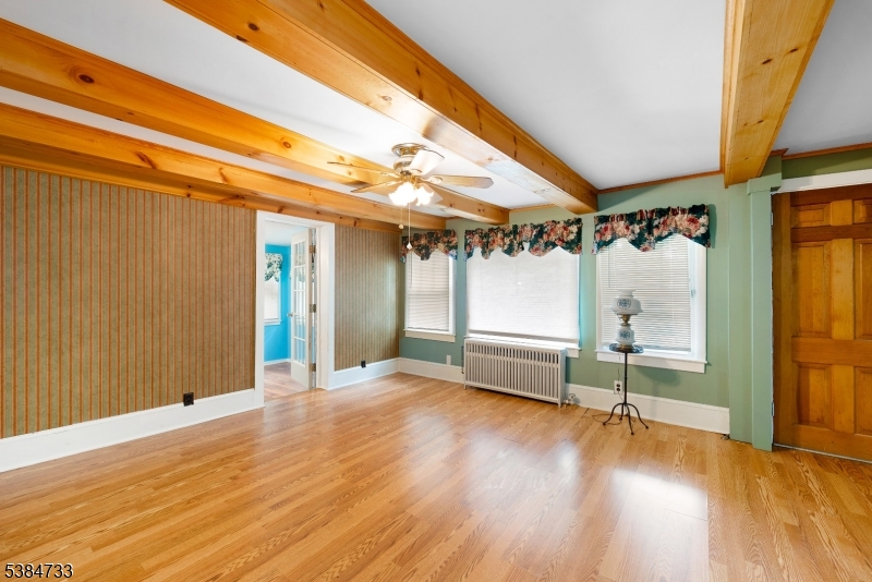 400 Quaker Church Road Randolph, NJ 07869 - Photo 15 of 34 a view of an empty room with wooden floor and a window