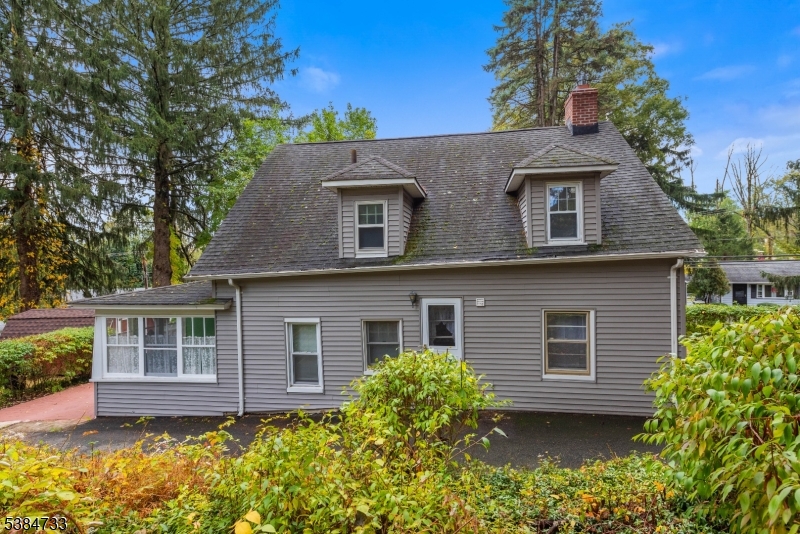 400 Quaker Church Road Randolph, NJ 07869 - Photo 5 of 34 front view of a house with a yard