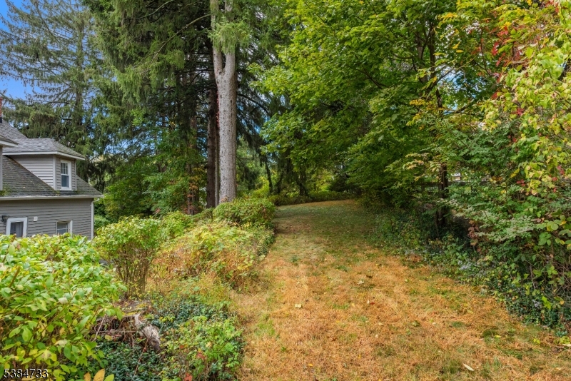 400 Quaker Church Road Randolph, NJ 07869 - Photo 8 of 34 front view of a house with a yard