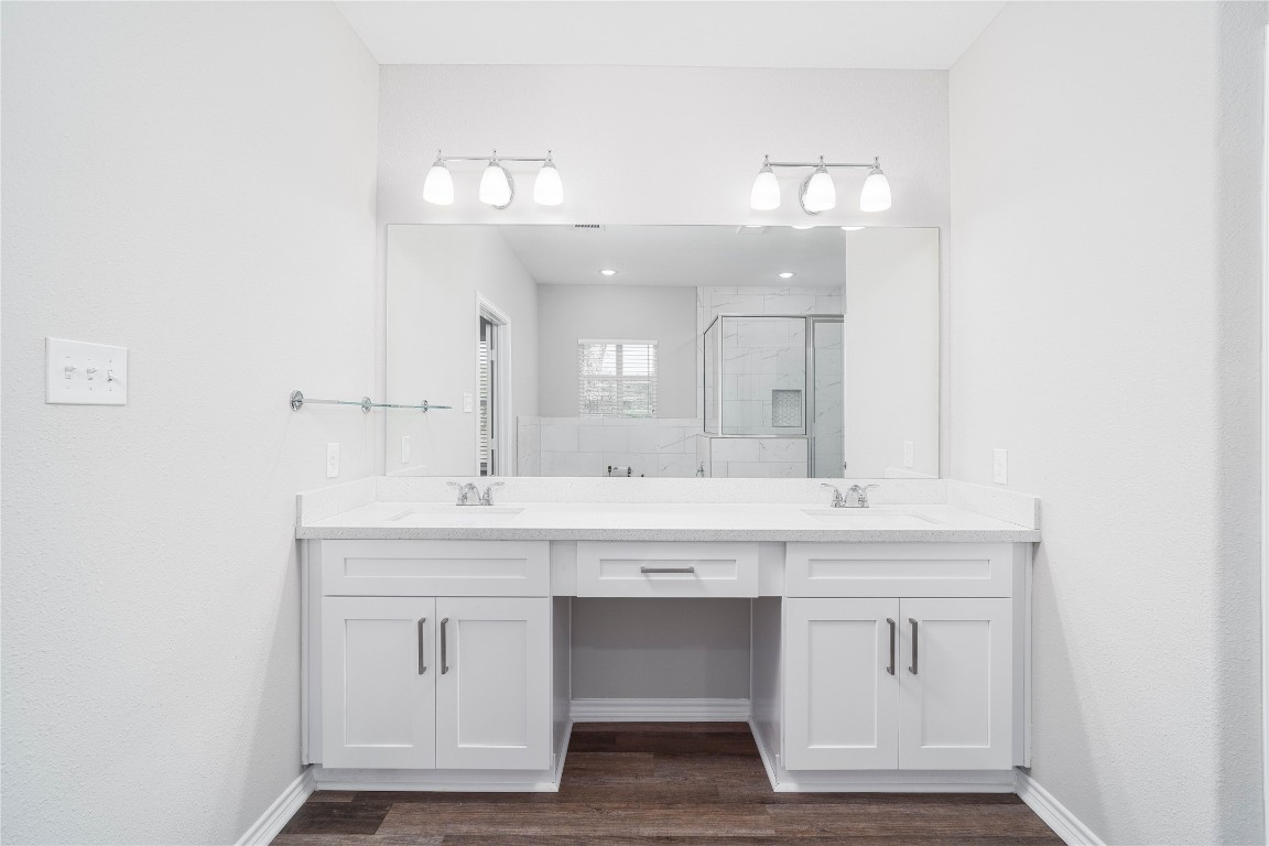 231 McCormick Street Columbus, TX 78934 - Photo 14 of 27 Primary Bathroom (Alternative View) - Dual sink vanity with quartz countertops.
