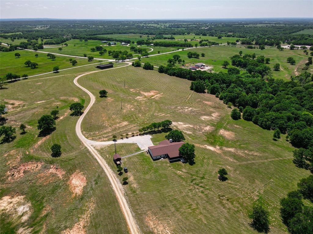2043 Huddleston Road Sunset, TX 76270 - Photo 3 of 36 an aerial view of a residential houses