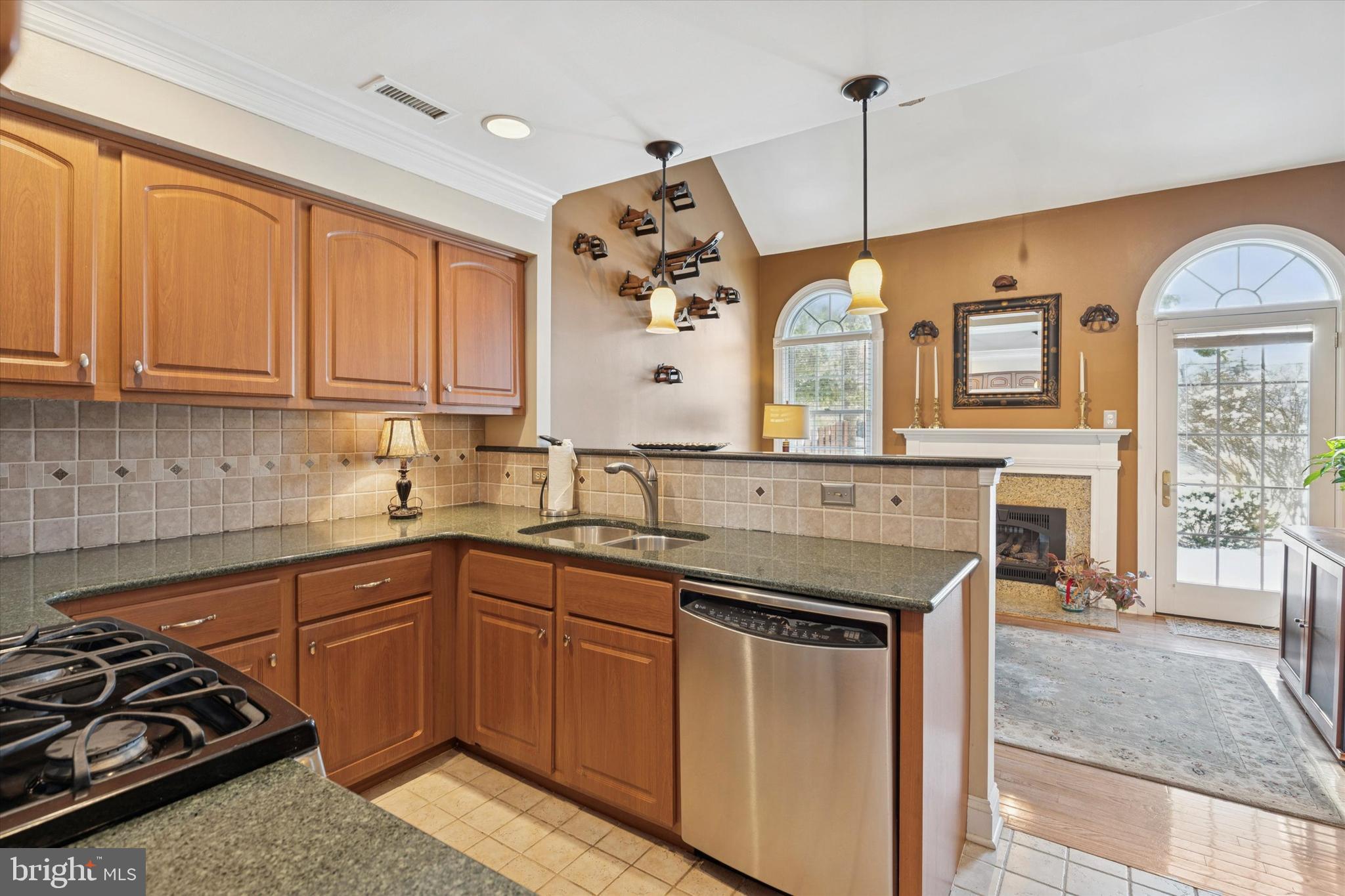 48 Cadwalader Court Ambler, PA 19002 - Photo 6 of 28 Kitchen Open to Den & Patio Door