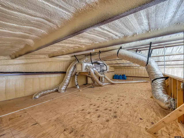 a view of a swimming pool with a yard