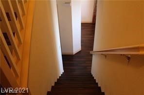 207 Priority Point Street Henderson, NV 89012 - Photo 12 of 38 Staircase with wood finished floors