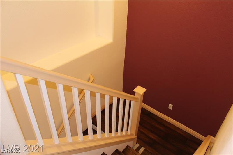 207 Priority Point Street Henderson, NV 89012 - Photo 13 of 38 Staircase featuring wood finished floors