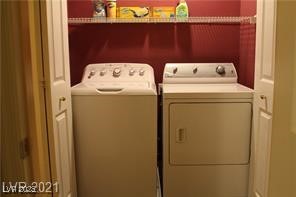 207 Priority Point Street Henderson, NV 89012 - Photo 15 of 38 Laundry area with washing machine and dryer