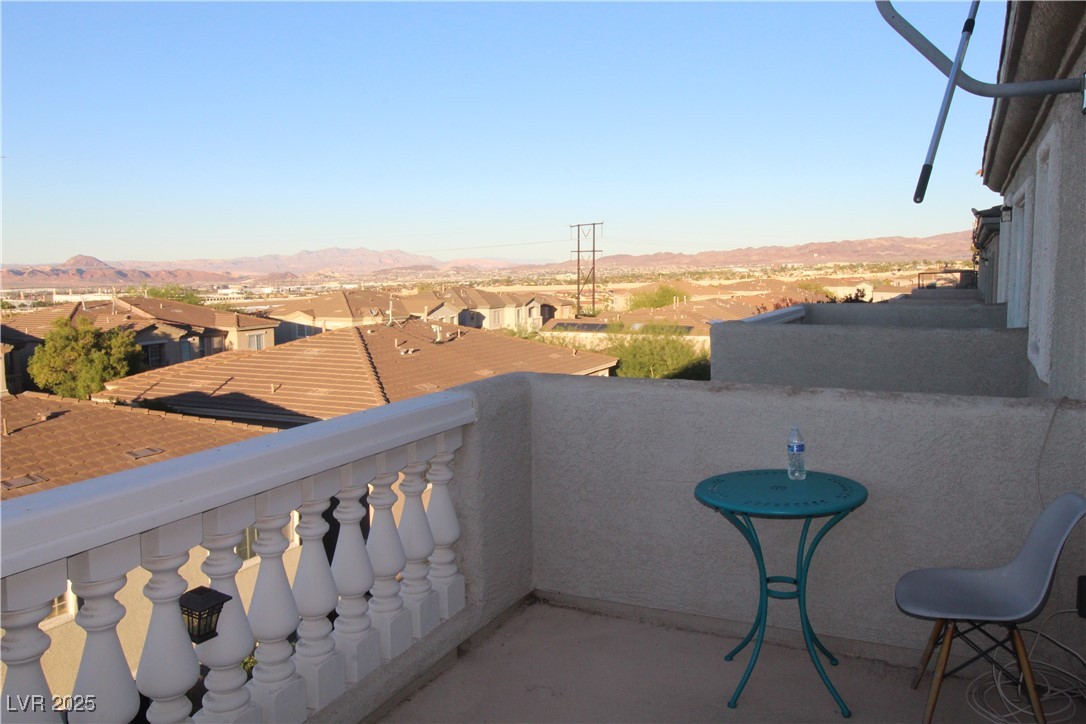 207 Priority Point Street Henderson, NV 89012 - Photo 19 of 38 Balcony with a residential view and a mountain view