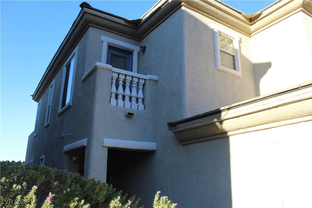 207 Priority Point Street Henderson, NV 89012 - Photo 2 of 38 View of property exterior featuring stucco siding