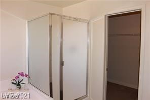 207 Priority Point Street Henderson, NV 89012 - Photo 24 of 38 Bathroom with a shower stall and a walk in closet