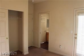 207 Priority Point Street Henderson, NV 89012 - Photo 26 of 38 Unfurnished bedroom featuring a closet and connected bathroom