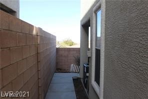 207 Priority Point Street Henderson, NV 89012 - Photo 33 of 38 View of property exterior with stucco siding