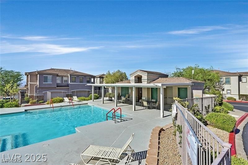 207 Priority Point Street Henderson, NV 89012 - Photo 36 of 38 Community pool with a patio