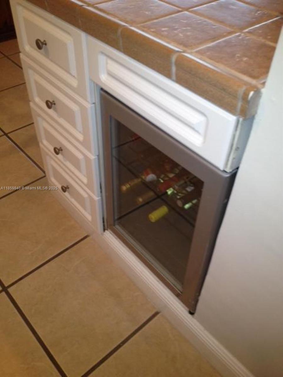 5313 Collins Avenue, Unit 710 Miami Beach, FL 33140 - Photo 11 of 17 a close view of washer and dryer