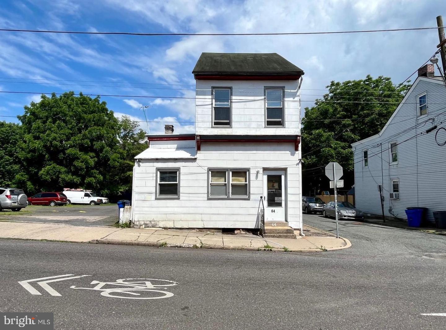 64 South Evans Street, Unit 3 Pottstown, PA 19464 - Photo 1 of 15 a front view of a house with a road