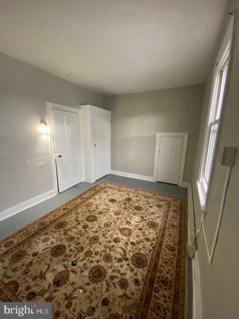 64 South Evans Street, Unit 3 Pottstown, PA 19464 - Photo 8 of 15 wooden floor in an empty room