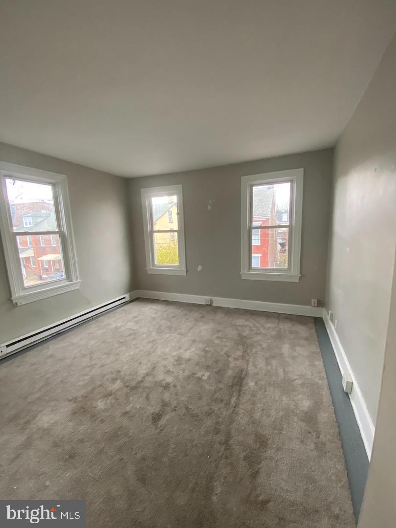 64 South Evans Street, Unit 3 Pottstown, PA 19464 - Photo 10 of 15 an empty room with windows