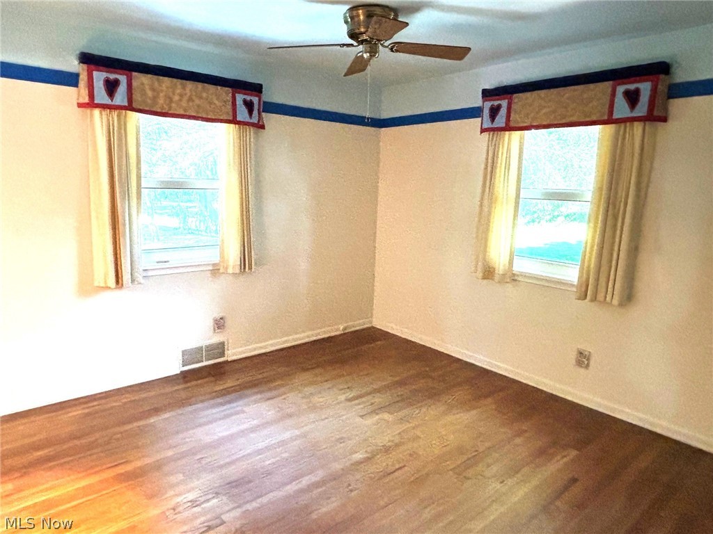 1961 Killian Road Akron, OH 44312 - Photo 14 of 23 Bedroom with hardwood floors