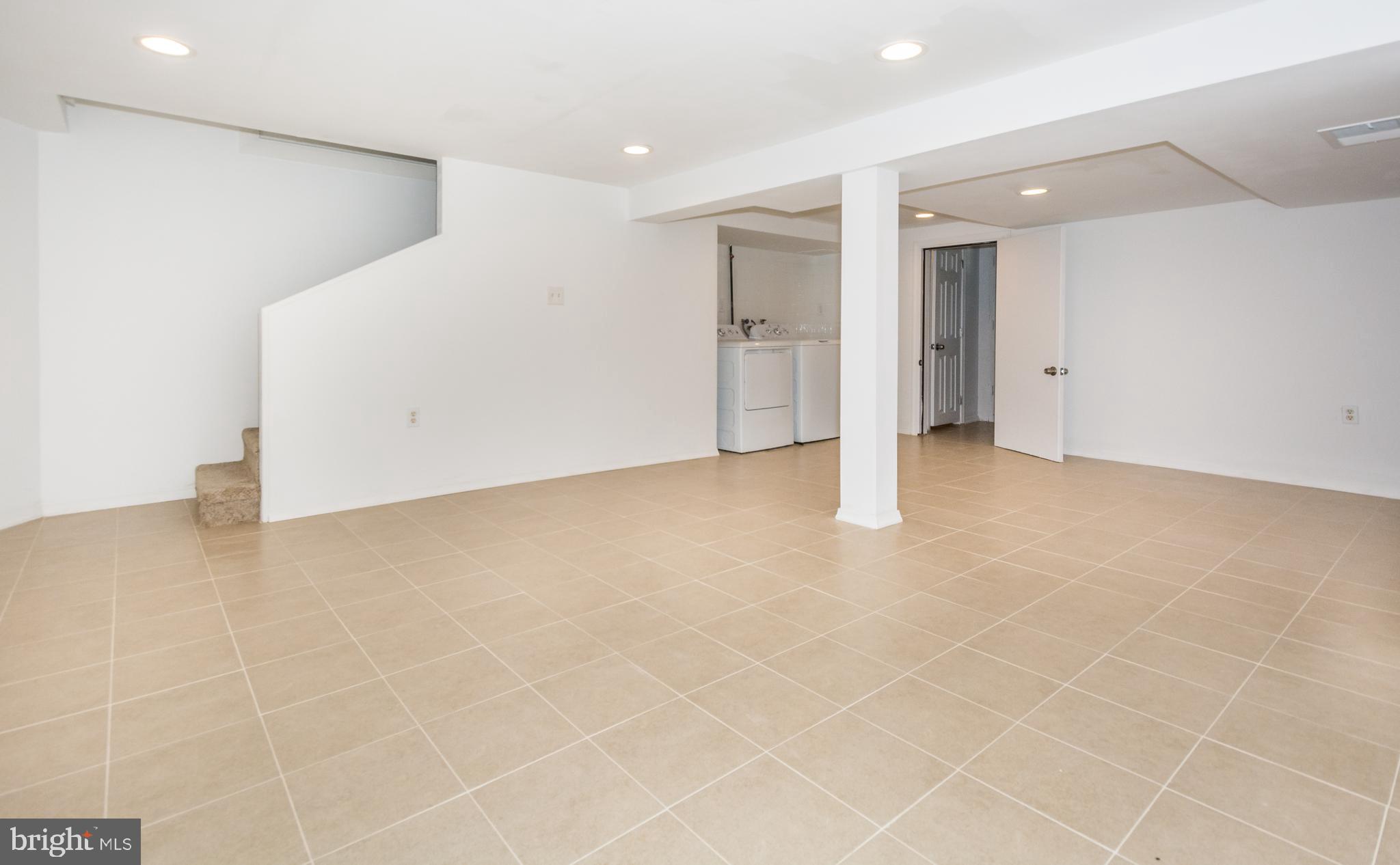 4017 Bareva Road Baltimore, MD 21215 - Photo 23 of 34 Ceramic tile Basement
