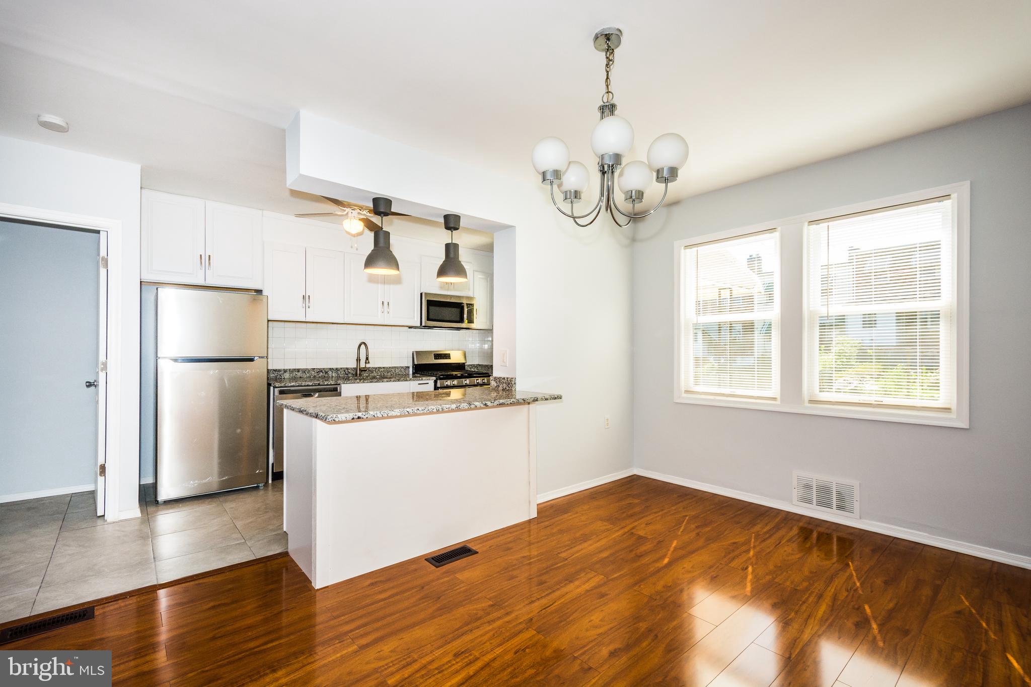 Open Concept | Kitchen -Engineered Hardwood