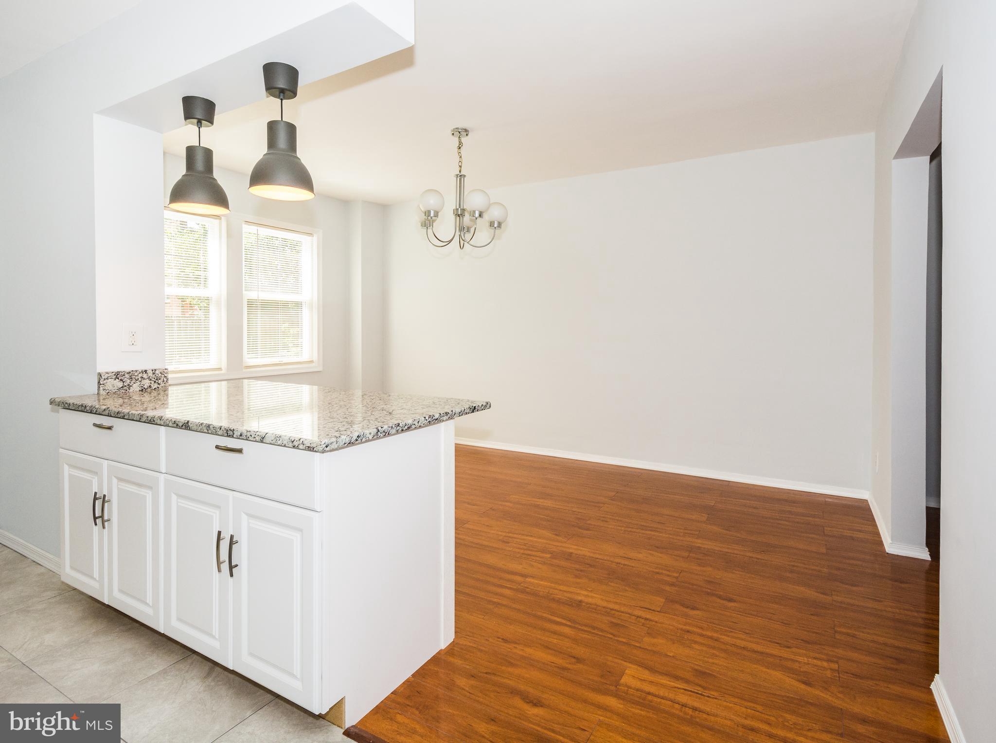 Kitchen | Living Room -Engineered Hardwood