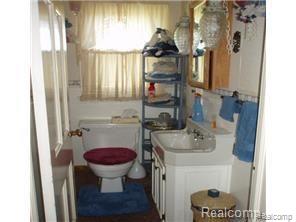 3402 West Akron Road Akron, MI 48701 - Photo 10 of 16 3402 half bath on main floor.jpg