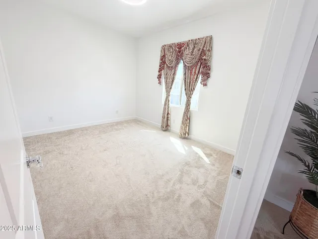 a view of a room with a window