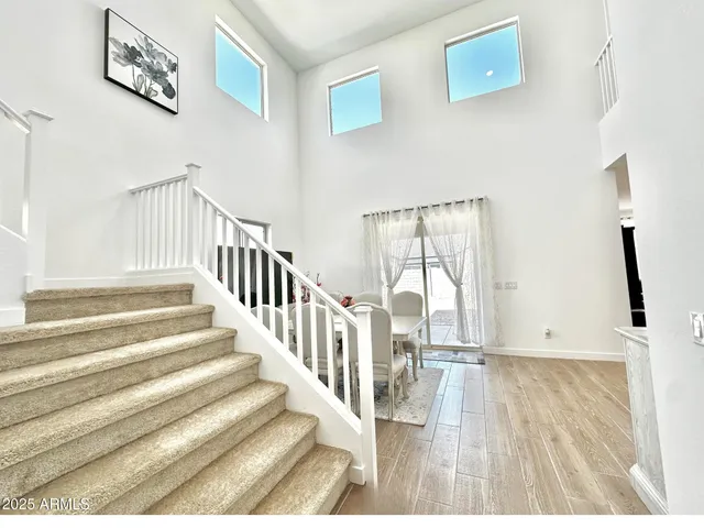 a view of entryway with wooden floor