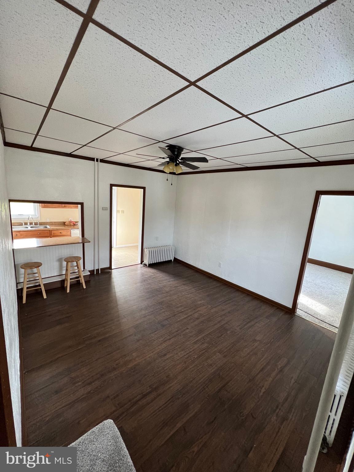 906 Lemon Street Johnstown, PA 15902 - Photo 9 of 13 a view of a livingroom with wooden floor