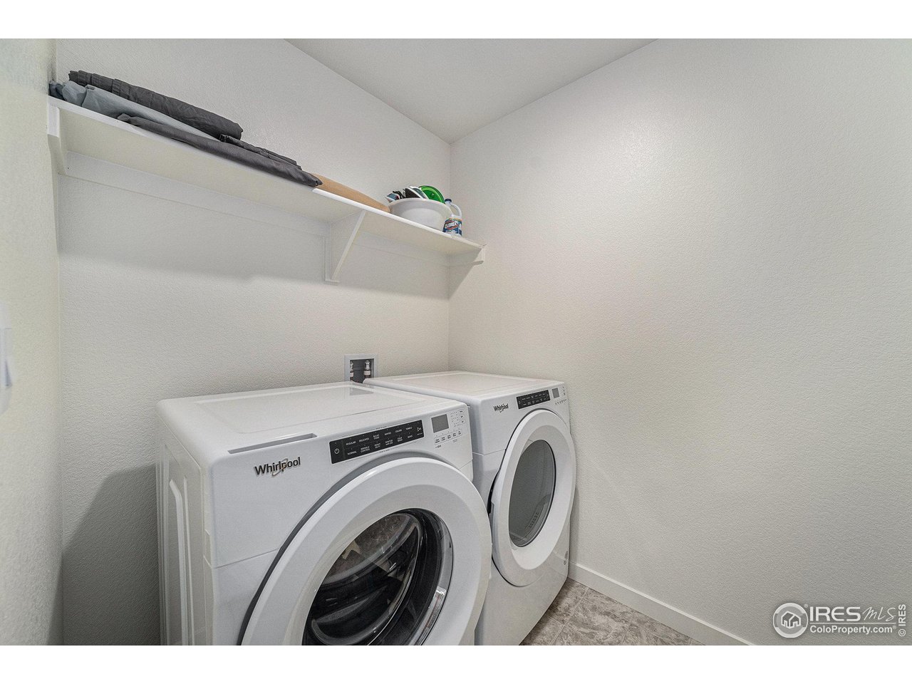 439 Bluebird Road Johnstown, CO 80534 - Photo 28 of 36 a utility room with dryer and washer