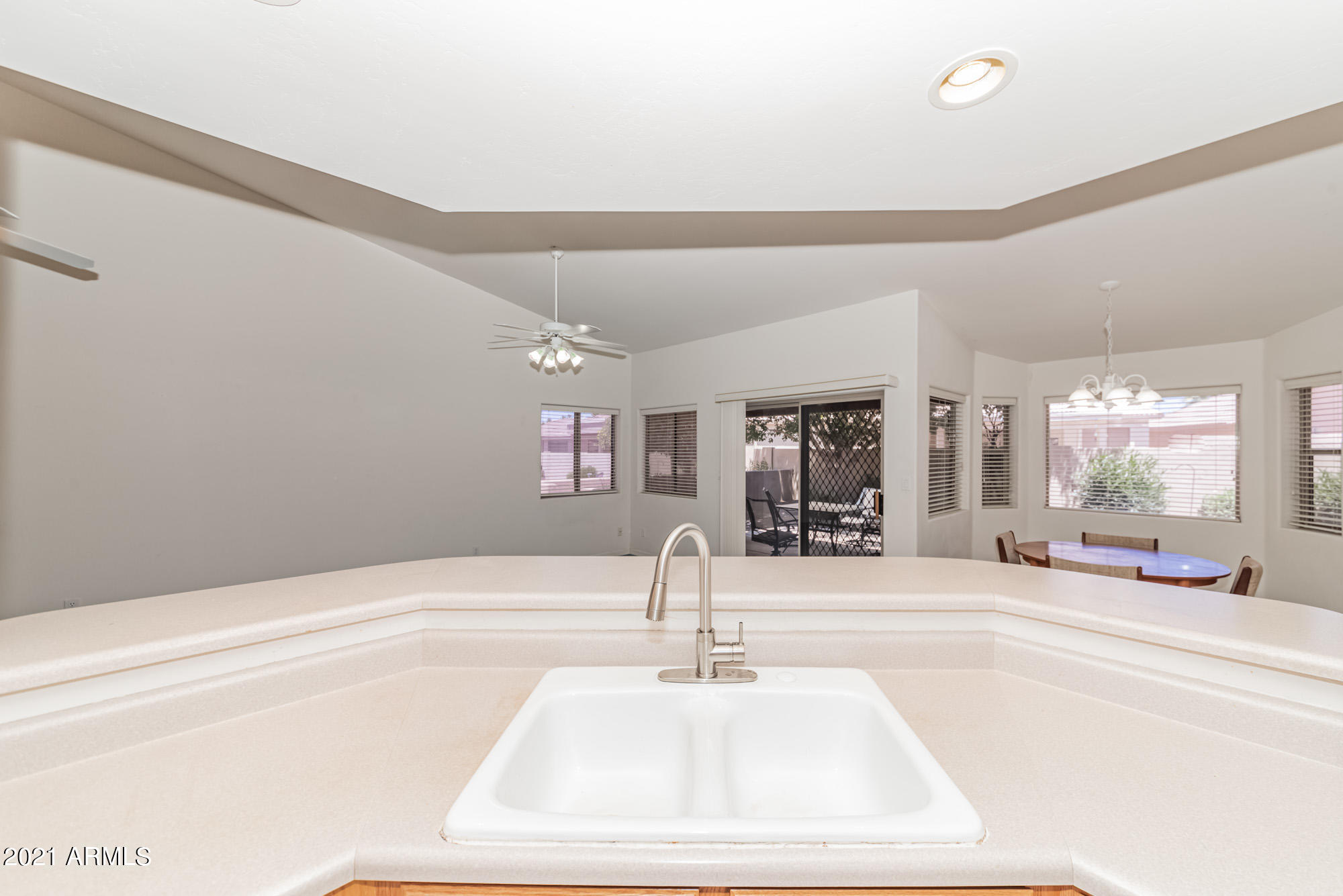 5830 East McKellips Road, Unit 56 Mesa, AZ 85215 - Photo 14 of 47 a bathroom with a sink and a mirror