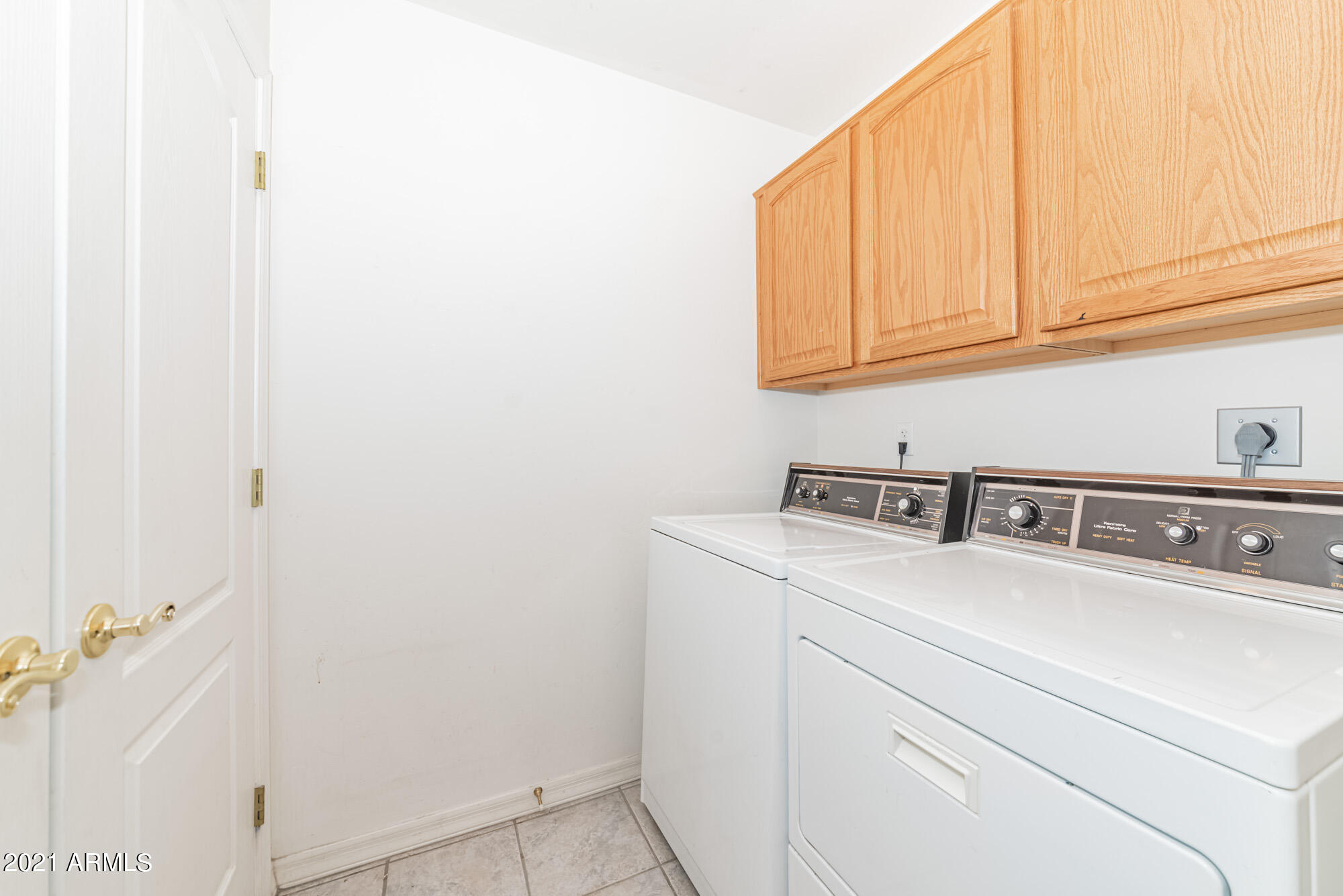5830 East McKellips Road, Unit 56 Mesa, AZ 85215 - Photo 18 of 47 a utility room with dryer and washer