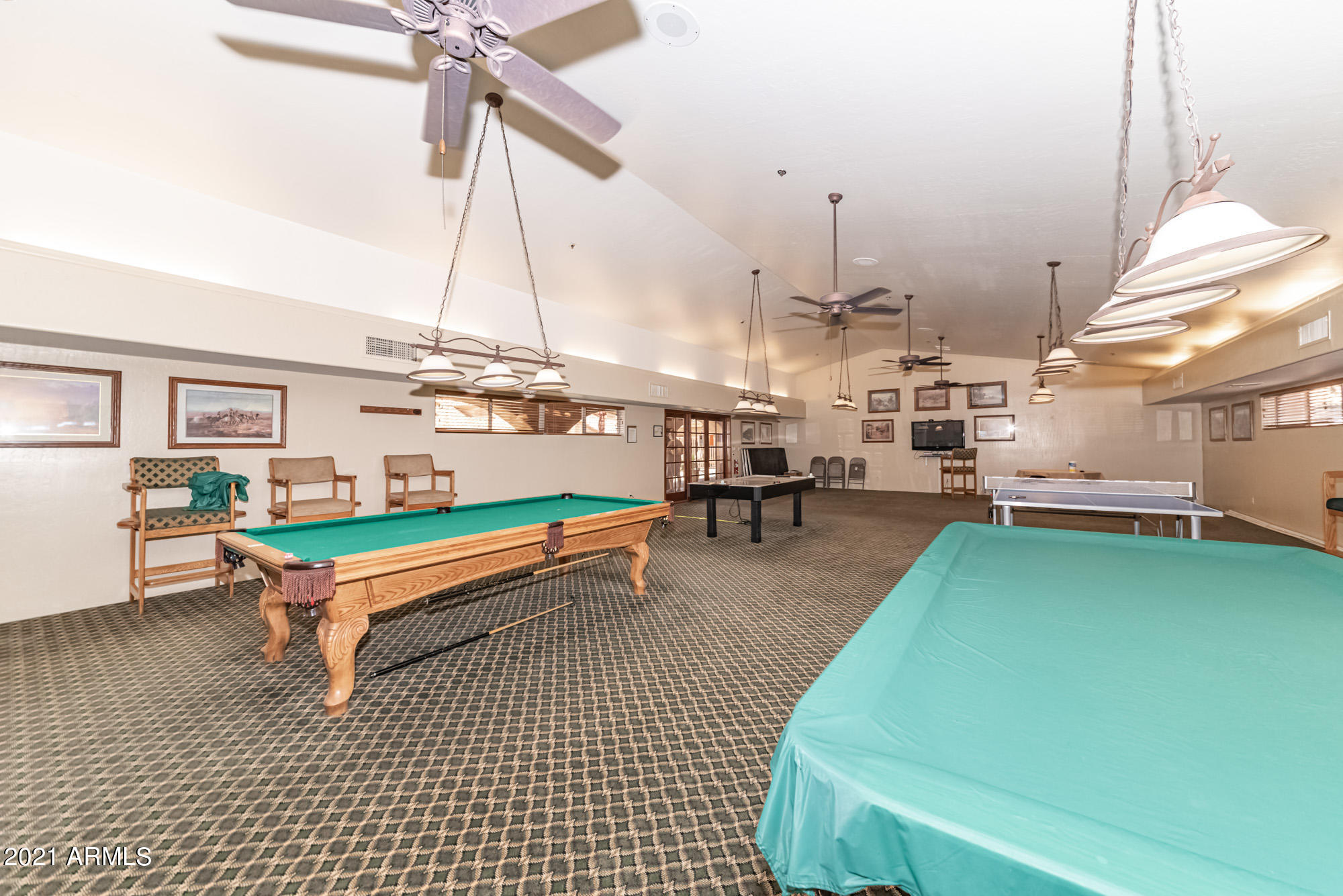 5830 East McKellips Road, Unit 56 Mesa, AZ 85215 - Photo 34 of 47 a room with pool table and windows
