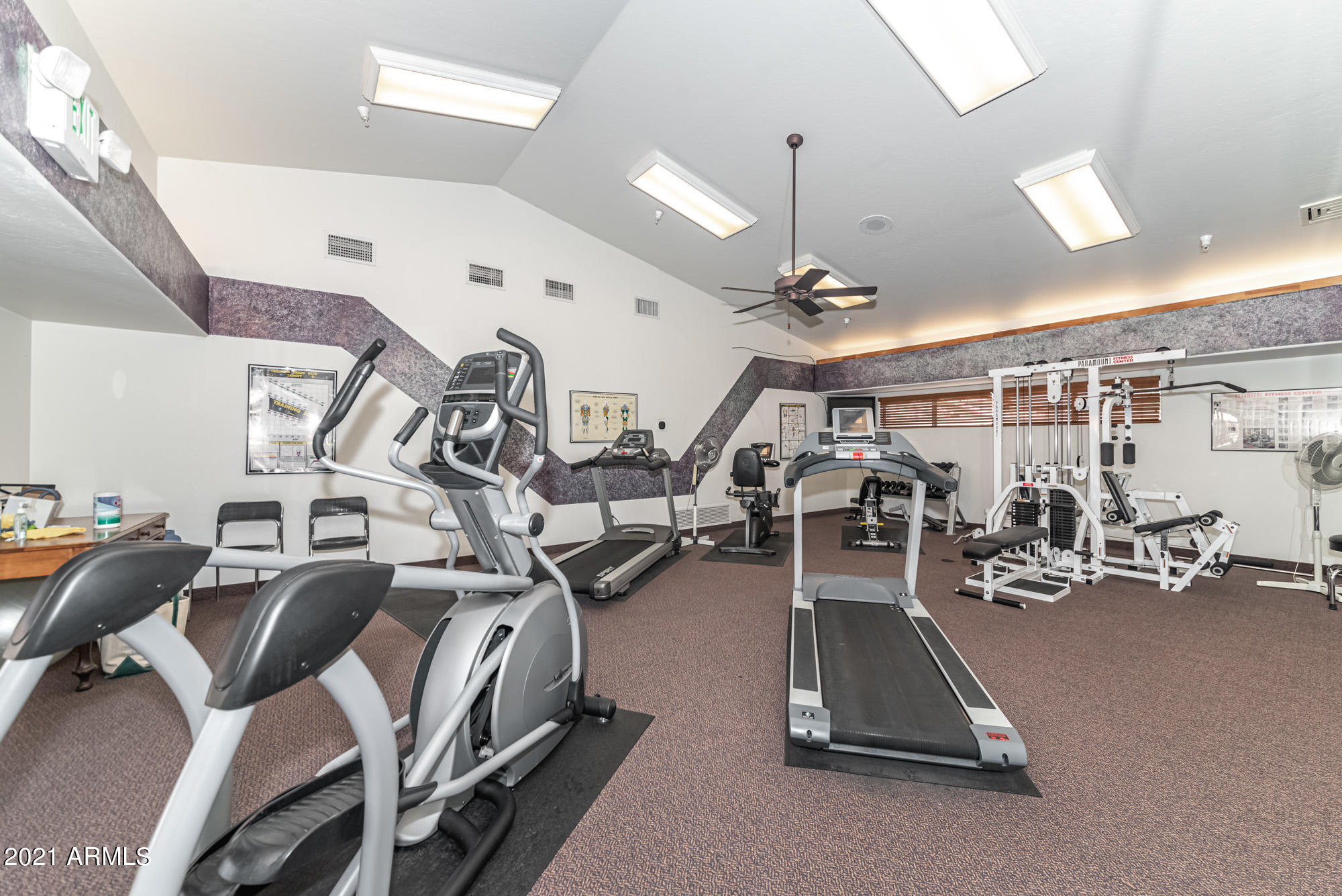 5830 East McKellips Road, Unit 56 Mesa, AZ 85215 - Photo 36 of 47 a view of a room with gym equipment