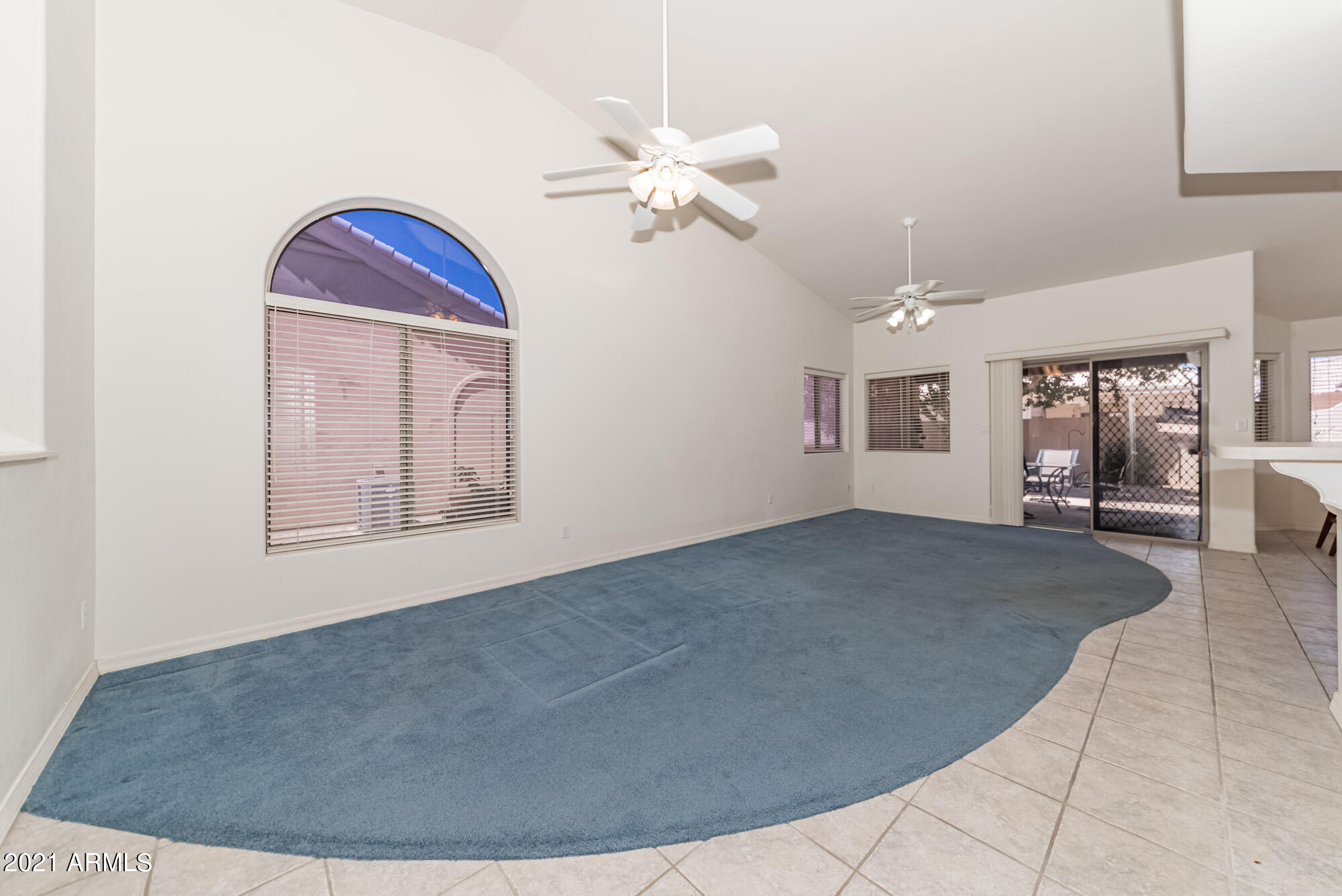 5830 East McKellips Road, Unit 56 Mesa, AZ 85215 - Photo 6 of 47 a view of a livingroom with a ceiling fan