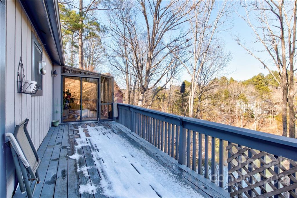 10043 Tepa Place Tega Cay, SC 29708 - Photo 20 of 32 a view of wooden balcony with wooden floor and fence