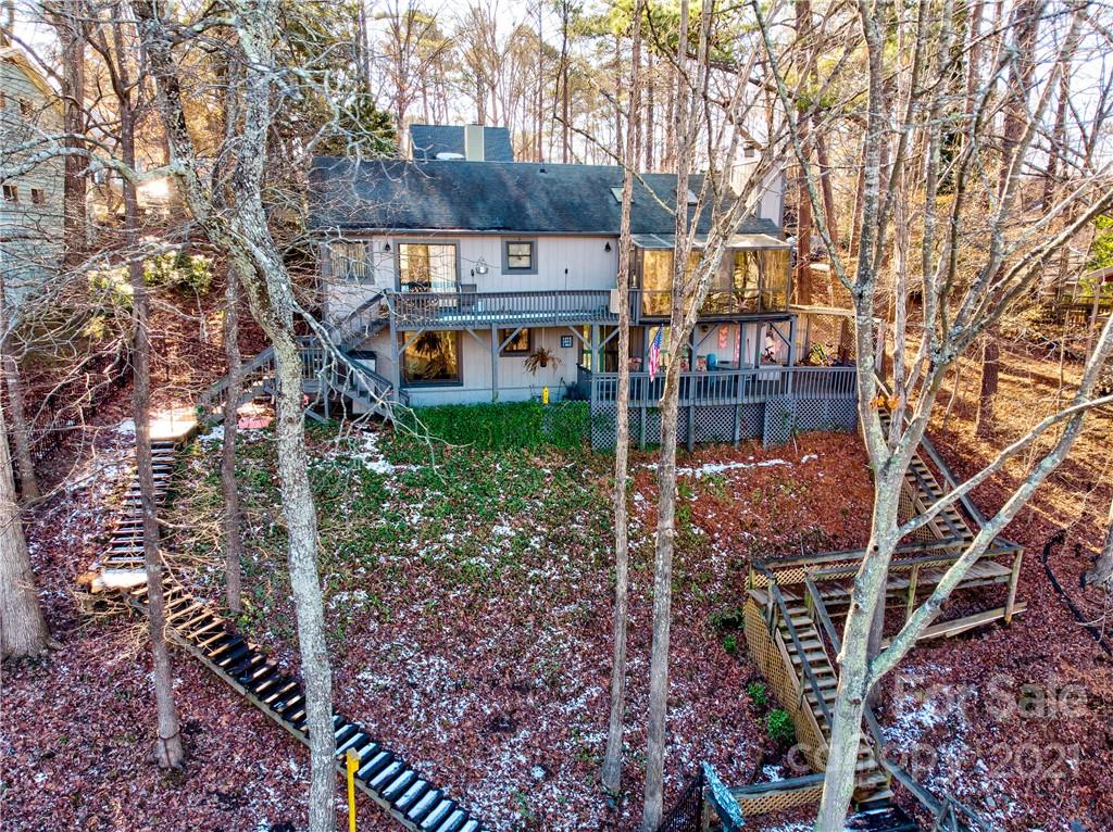 10043 Tepa Place Tega Cay, SC 29708 - Photo 21 of 32 a view of a house with a yard