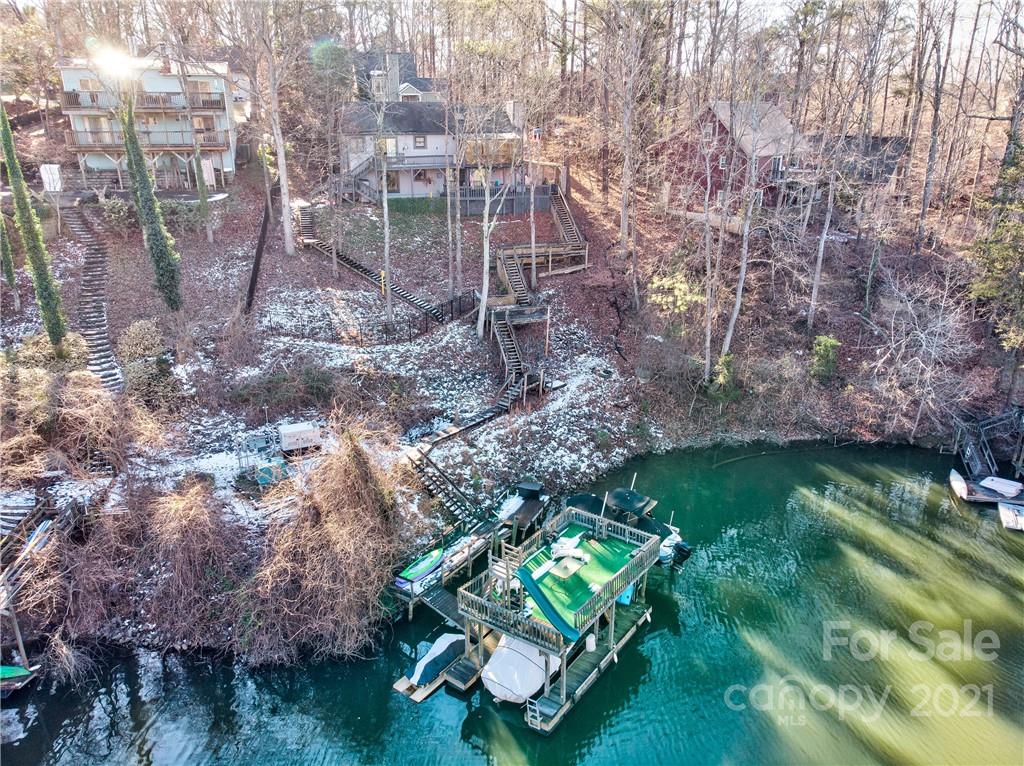10043 Tepa Place Tega Cay, SC 29708 - Photo 26 of 32 a backyard of a house with lots of green space