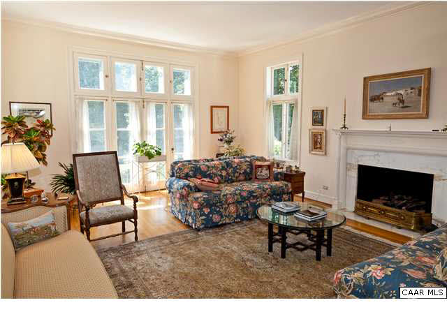 940 Windsor Road Charlottesville, VA 22901 - Photo 10 of 33 a living room with furniture a large window and a fireplace