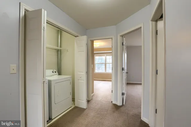 a view of entryway with bathroom