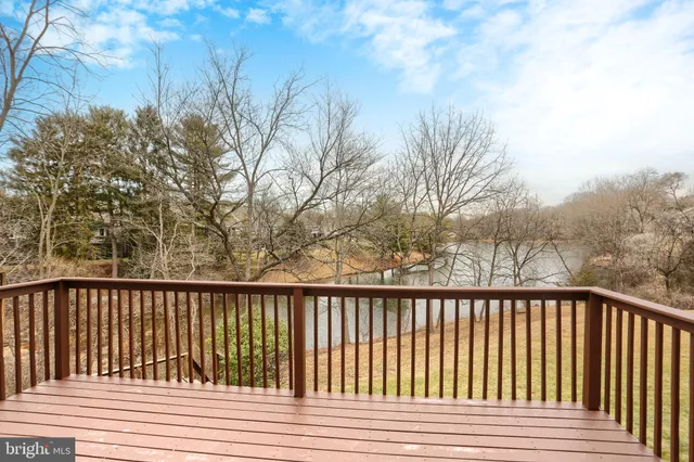 a balcony with trees in front of it