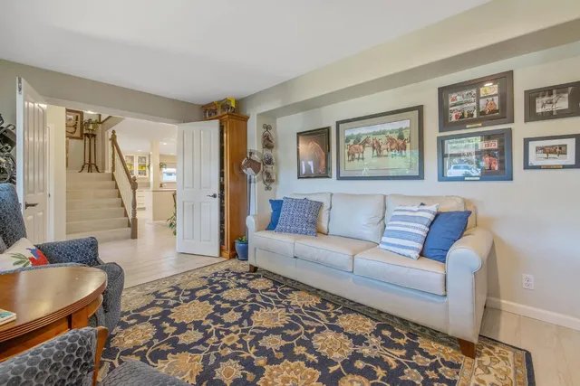 a kitchen with stainless steel appliances granite countertop a stove and a sink