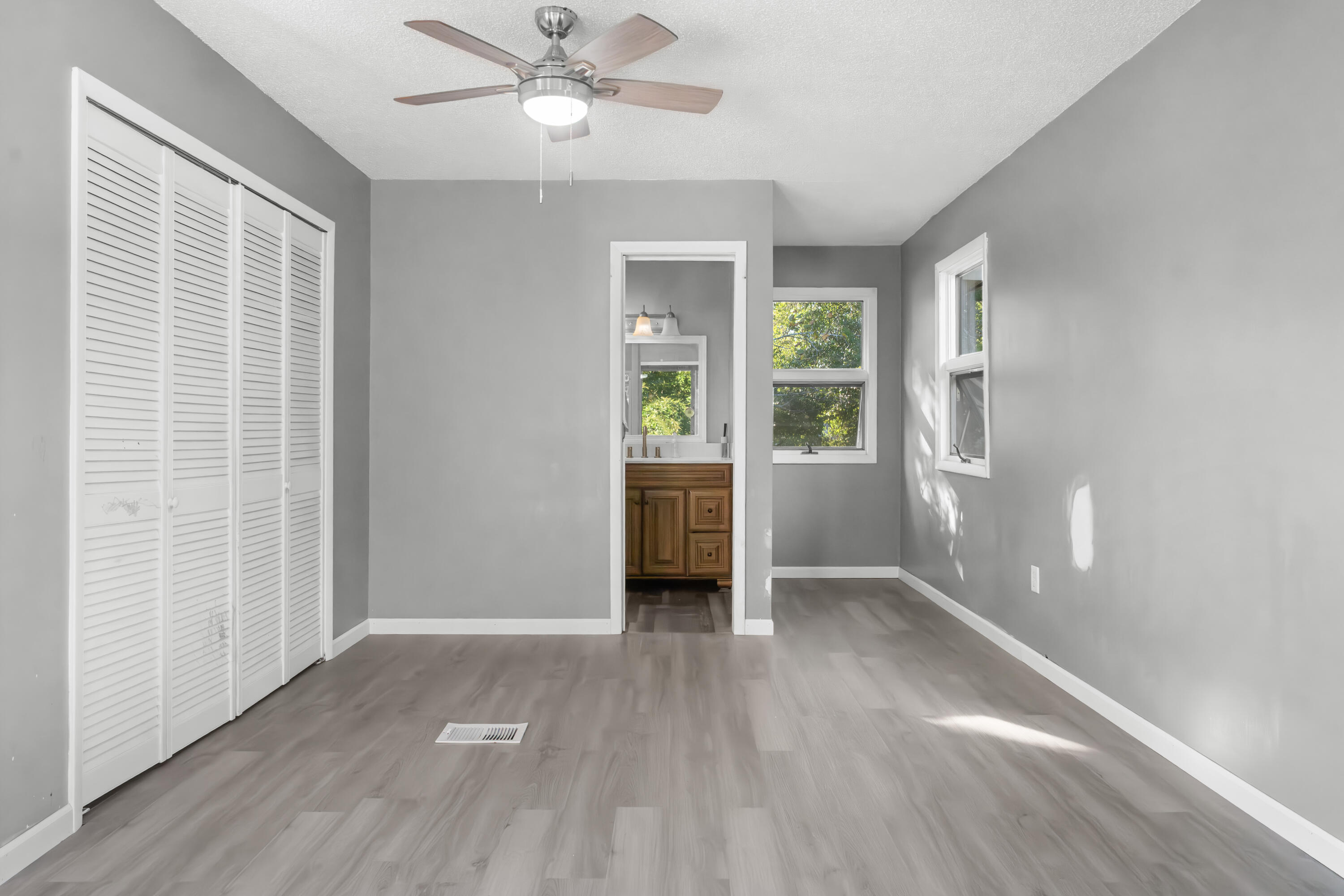512 Lang Road Fort Walton Beach, FL 32547 - Photo 25 of 51 wooden floor in an empty room with a window