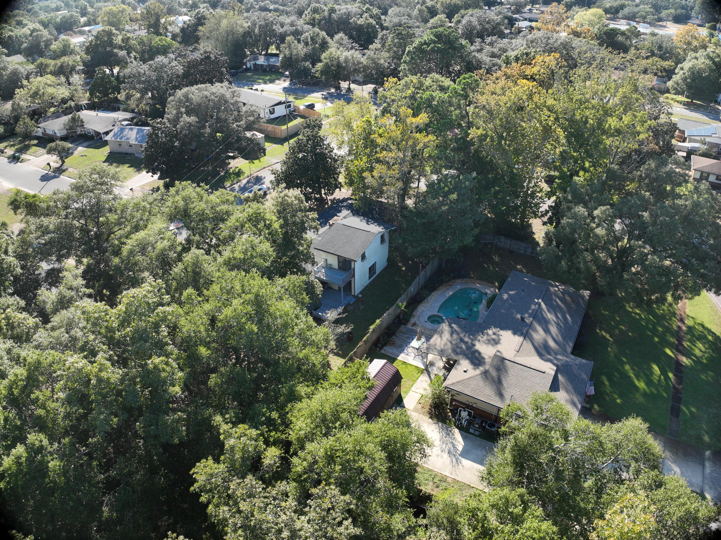 512 Lang Road Fort Walton Beach, FL 32547 - Photo 45 of 51 an aerial view of a house with a yard
