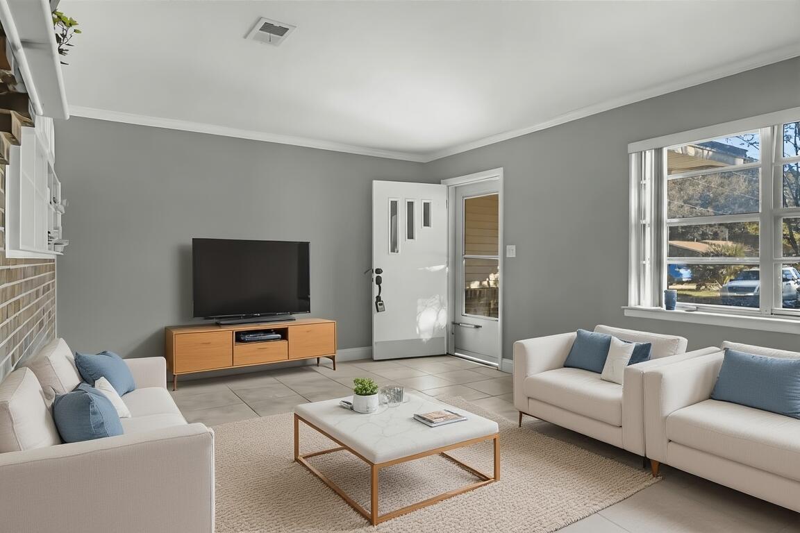 512 Lang Road Fort Walton Beach, FL 32547 - Photo 6 of 51 a living room with furniture and a flat screen tv