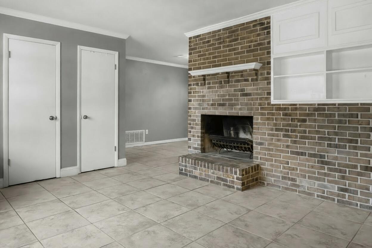 512 Lang Road Fort Walton Beach, FL 32547 - Photo 10 of 51 a view of empty room with fireplace