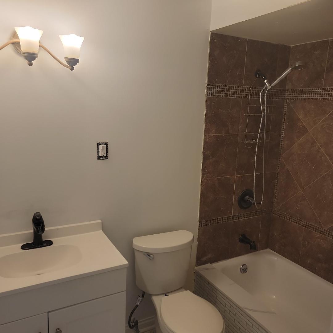 7 Wildwood Road Elk Grove Village, IL 60007 - Photo 6 of 7 a bathroom with a toilet and a sink