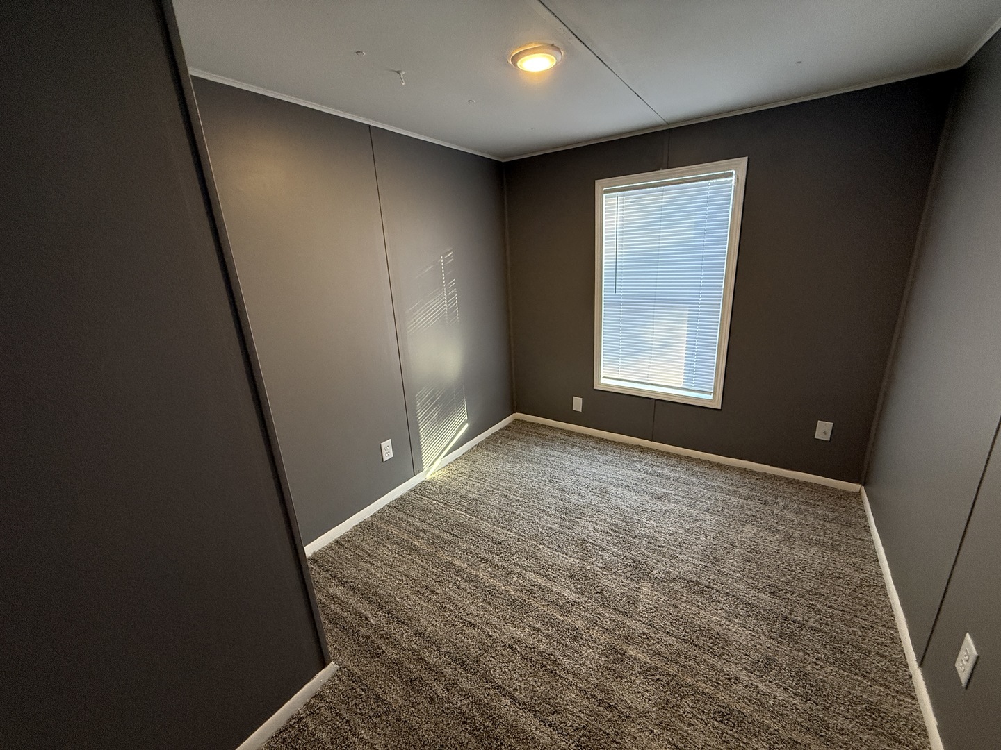 1712 South Dixie Highway, Unit 19 Crete, IL 60417 - Photo 12 of 12 an empty room with windows