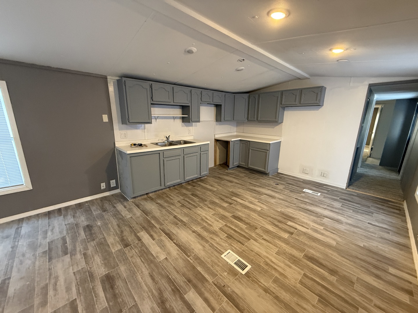 1712 South Dixie Highway, Unit 19 Crete, IL 60417 - Photo 7 of 11 a kitchen with a refrigerator and a stove top oven