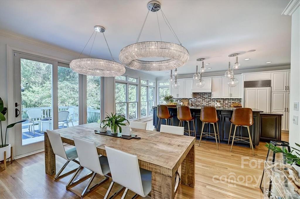 18600 Hammock Lane Davidson, NC 28036 - Photo 12 of 48 a view of a dining room with furniture window and outside view
